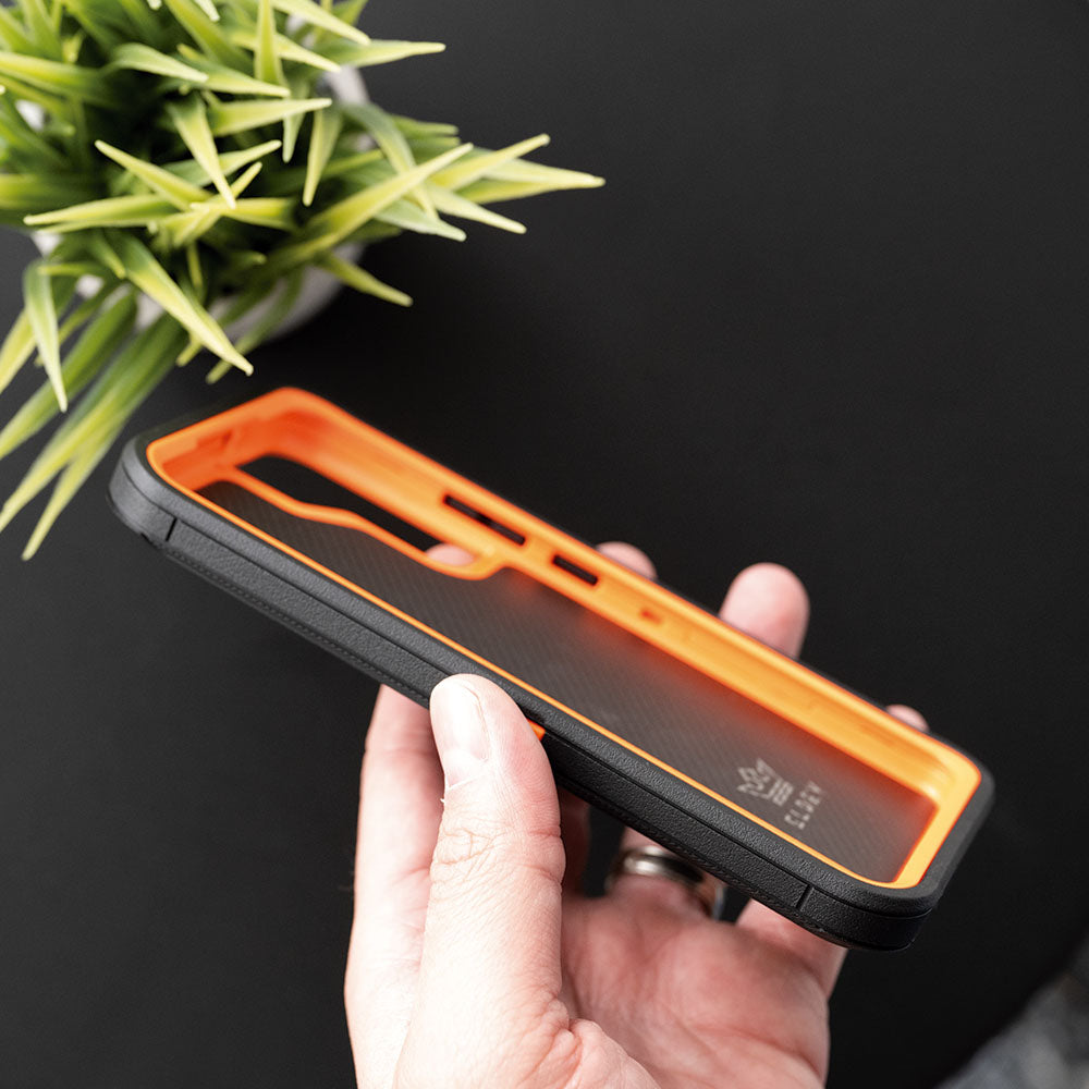 Estuche proteccion el rey defender samsung s22 plus color negro / naranja Shop name